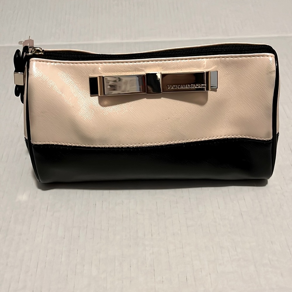 Victoria Secret makeup bag pink and black with gold bow on front